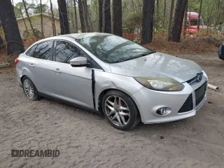 2014 Ford Focus Titanium with VIN 1FADP3J20EL148417, listed as a IAAI auction lot 41954291 with 120,098 mi miles. Bid and sale history available at carsss.com. Image 1.