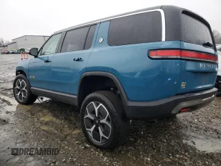2024 Rivian R1S Adventure z VIN 7PDSGABA1RN031444, wystawiony jako Copart lot #43312765 z przebiegiem Nie podano mil oraz Szkody całkowita. Historia ofert i sprzedaży dostępna na DreamBid. Obrazek 2.