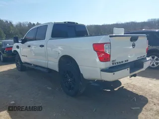 2018 Nissan Titan XD SV with VIN 1N6BA1F40JN523851, listed as a IAAI auction lot 41800730 with 104,527 mi miles. Bid and sale history available at carsss.com. Image 3.