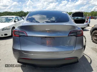 2024 Tesla Model Y Long Range z VIN 7SAYGDEE7RA308338, wystawiony jako Copart lot #61137375 z przebiegiem 19 501 mil mil oraz Szkoda całkowita • Salvage title. Historia ofert i sprzedaży dostępna na DreamBid. Obrazek 6.