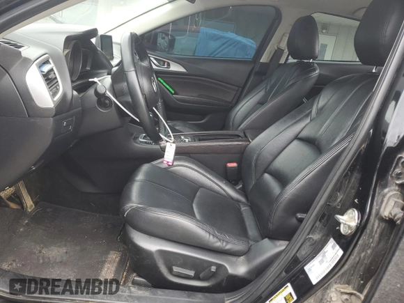 2017 Mazda 3 Touring with VIN 3MZBN1V76HM121191, listed as a Copart auction lot 57478855 with 113,362 mi miles and Salvage title. Bid and sale history available at DreamBid. Image 7.