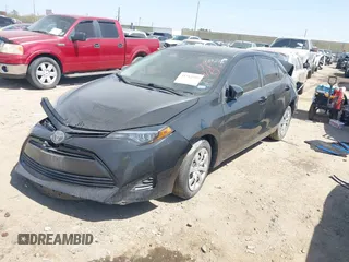 2019 Toyota Corolla L z VIN 2T1BURHE5KC237383, wystawiony jako IAAI lot #41782952 z przebiegiem 106 028 mil mil oraz . Historia ofert i sprzedaży dostępna na DreamBid. Obrazek 2.
