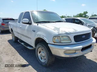 1997 Ford F-150 XL with VIN 1FTEX18L8VKC01405, listed as a IAAI auction lot 42795443 with 142,330 mi miles and . Bid and sale history available at DreamBid. Image 1.