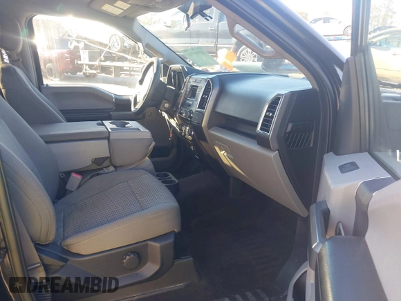 2015 Ford F-150 XLT with VIN 1FTEW1E86FFC00959, listed as a IAAI auction lot 41581711 with 130,298 mi miles. Bid and sale history available at carsss.com. Image 5.