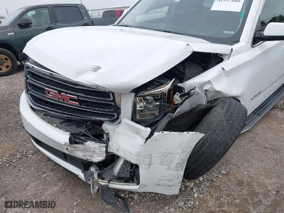 2019 GMC Yukon SLT with VIN 1GKS2BKC6KR183607, listed as a IAAI auction lot 41557880 with 120,971 mi miles. Bid and sale history available at carsss.com. Image 6.