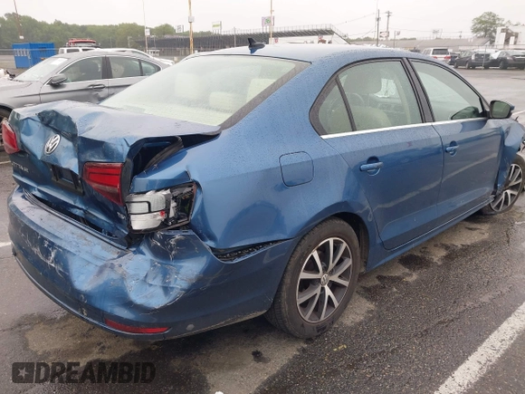 2017 Volkswagen Jetta SE with VIN 3VWDB7AJ0HM293674, listed as a IAAI auction lot 42457531 with 74,109 mi miles and . Bid and sale history available at DreamBid. Image 4.