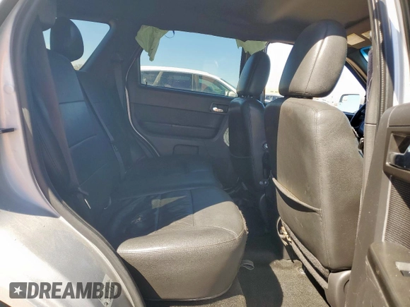 2011 Ford Escape Limited с VIN 1FMCU0EG3BKC18878, выставлен на аукционе Copart как лот 49438525 с пробегом 179 997 миль миль и Списание • Salvage title. История ставок и продаж доступна на DreamBid. Изображение 11.