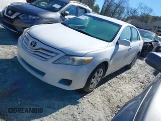 2010 Toyota Camry with VIN 4T1BF3EKXAU512860, listed as a IAAI auction lot 41590070 with 212,659 mi miles and . Bid and sale history available at DreamBid. Image 2.