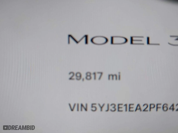 2023 Tesla Model 3 with VIN 5YJ3E1EA2PF642253, listed as a IAAI auction lot 41777160 with 29,817 mi miles. Bid and sale history available at carsss.com. Image 15.
