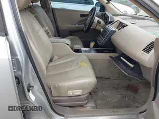 2003 Nissan Murano SE z VIN JN8AZ08TX3W103022, wystawiony jako IAAI lot #42216357 z przebiegiem 208 838 mil mil oraz . Historia ofert i sprzedaży dostępna na DreamBid. Obrazek 5.