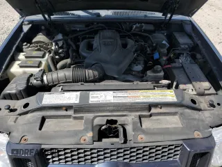 2001 Ford Explorer Sport Trac z VIN 1FMZU77E61UB01605, wystawiony jako Copart lot #56976175 z przebiegiem 106 313 mil mil oraz Tytuł czysty. Historia ofert i sprzedaży dostępna na DreamBid. Obrazek 11.