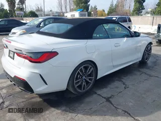 2022 BMW 4 Series M440i with VIN WBA53AT02NCJ20674, listed as a IAAI auction lot 41200398 with 28,235 mi miles and . Bid and sale history available at DreamBid. Image 4.