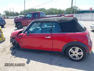 2006 MINI Convertible with VIN WMWRF33556TG14466, listed as a IAAI auction lot 42096368 with 120,230 mi miles and . Bid and sale history available at DreamBid. Image 15.