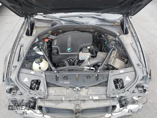 2015 BMW 5 Series 528i with VIN WBA5A5C56FD514814, listed as a IAAI auction lot 42052381 with 76,306 mi miles. Bid and sale history available at carsss.com. Image 10.