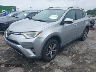2018 Toyota RAV4 XLE with VIN 2T3WFREV4JW486939, listed as a IAAI auction lot 42355448 with 133,655 mi miles and . Bid and sale history available at DreamBid. Image 2.