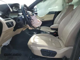 2018 BMW X1 xDrive28i with VIN WBXHT3C31J5K25021, listed as a Copart auction lot 48779555 with 71,741 mi miles and Salvage Title. Bid and sale history available at carsss.com. Image 7.