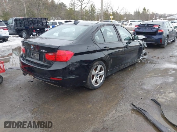 2014 BMW 3 Series 328i xDrive with VIN WBA3B5C55EP539916, listed as a IAAI auction lot 41636682 with 110,262 mi miles. Bid and sale history available at carsss.com. Image 4.