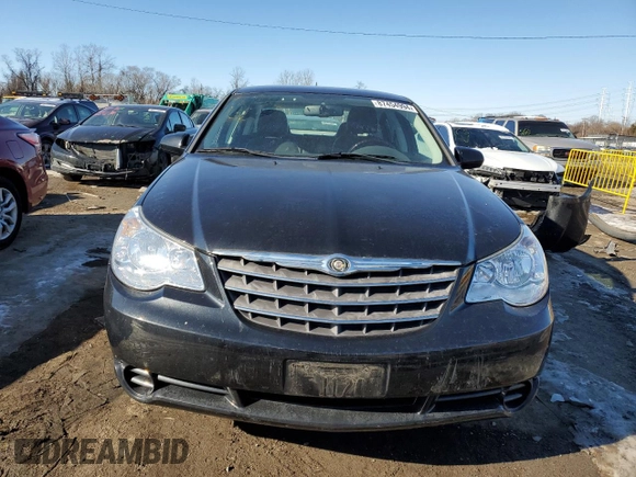 2010 Chrysler Sebring Limited with VIN 1C3CC5FB4AN111539, listed as a Copart auction lot 87454994 with 53,979 mi miles and Salvage Title. Bid and sale history available at DreamBid. Image 5.