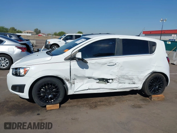 2012 Chevrolet Sonic LT with VIN 1G1JC6SB4C4214346, listed as a IAAI auction lot 40296983 with 116,014 mi miles. Bid and sale history available at carsss.com. Image 6.