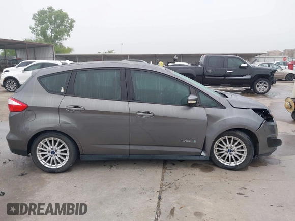 2013 Ford C-Max SE with VIN 1FADP5AUXDL535889, listed as a IAAI auction lot 42161407 with 103,978 mi miles and . Bid and sale history available at DreamBid. Image 14.