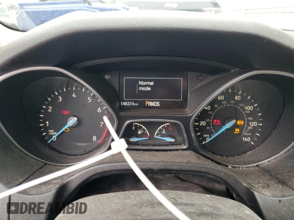 2015 Ford Focus SE z VIN 1FADP3F29FL340350, wystawiony jako Copart lot #53466455 z przebiegiem 146 374 mil mil oraz Szkoda całkowita • Salvage title. Historia ofert i sprzedaży dostępna na DreamBid. Obrazek 9.