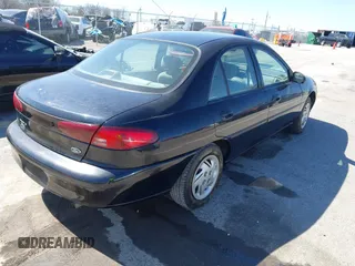 1999 Ford Escort LX with VIN 1FAFP10P3XW287792, listed as a IAAI auction lot 41807938 with 247,141 mi miles. Bid and sale history available at carsss.com. Image 4.