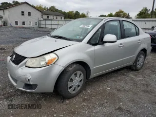 2009 Suzuki SX4 Man FWD with VIN JS2YC412396201554, listed as a Copart auction lot 72902194 with 135,355 mi miles and Salvage Title. Bid and sale history available at carsss.com. Image 1.