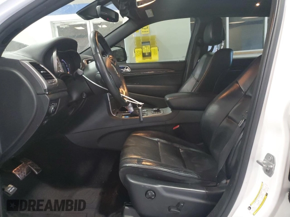 2018 Jeep Grand Cherokee Overland with VIN 1C4RJFCG5JC211145, listed as a Copart auction lot 54138865 with 115,679 mi miles and Salvage title. Bid and sale history available at DreamBid. Image 7.