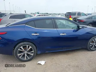 2016 Nissan Maxima S with VIN 1N4AA6AP4GC445341, listed as a IAAI auction lot 41890630 with 121,115 mi miles and . Bid and sale history available at DreamBid. Image 14.