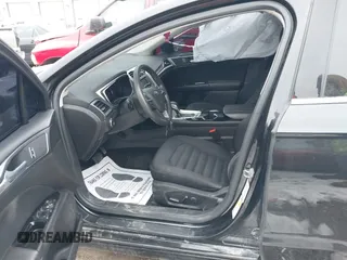 2014 Ford Fusion SE Hybrid with VIN 3FA6P0LUXER236740, listed as a IAAI auction lot 41399510 with 82,720 mi miles. Bid and sale history available at carsss.com. Image 5.