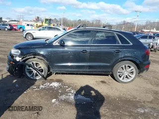2015 Audi Q3 Prestige with VIN WA1GFCFS4FR004025, listed as a IAAI auction lot 41286031 with 103,132 mi miles and . Bid and sale history available at DreamBid. Image 14.