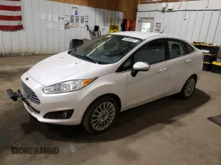 2016 Ford Fiesta Titanium z VIN 3FADP4CJ0GM167738, wystawiony jako Copart lot #57875245 z przebiegiem 159 230 mil mil oraz Czysty tytuł • Clean title. Historia ofert i sprzedaży dostępna na DreamBid. Obrazek 1.