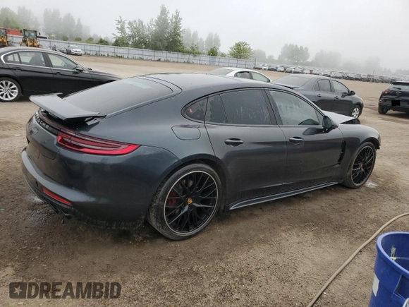 2018 Porsche Panamera 4S с VIN WP0AB2A79JL199068, выставлен на аукционе Copart как лот 60133525 с пробегом 72 003 миль миль и Списание • Salvage title. История ставок и продаж доступна на DreamBid. Изображение 3.