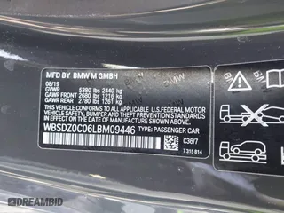 2020 BMW M8 with VIN WBSDZ0C06LBM09446, listed as a IAAI auction lot 41512994 with 25,745 mi miles. Bid and sale history available at carsss.com. Image 9.