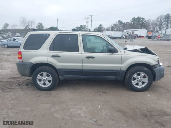 2005 Ford Escape XLT with VIN 1FMYU93135DA07844, listed as a IAAI auction lot 41786019 with 118,840 mi miles. Bid and sale history available at carsss.com. Image 13.