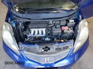 2009 Honda Fit with VIN JHMGE88279S059230, listed as a Copart auction lot 81409304 with 140,991 mi miles and Clean Title. Bid and sale history available at carsss.com. Image 12.