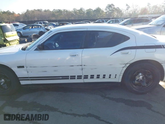 2010 Dodge Charger Police with VIN 2B3AA4CT5AH161604, listed as a IAAI auction lot 41814567 with 195,507 mi miles and . Bid and sale history available at DreamBid. Image 14.