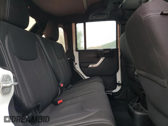 2013 Jeep Wrangler Unlimited Sahara with VIN 1C4HJWEG4DL562951, listed as a Copart auction lot 58001475 with 95,744 mi miles and Clean title. Bid and sale history available at DreamBid. Image 10.
