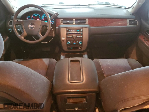 2010 GMC Yukon XL z VIN 1GKUKHE34AR126165, wystawiony jako Copart lot #52317135 z przebiegiem 234 675 mil mil oraz Tytuł czysty. Historia ofert i sprzedaży dostępna na DreamBid. Obrazek 8.