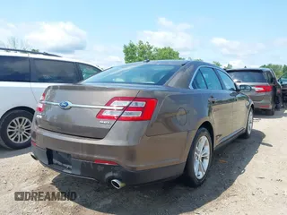 2015 Ford Taurus SEL with VIN 1FAHP2E82FG201994, listed as a IAAI auction lot 42750171 with 228,873 mi miles and . Bid and sale history available at DreamBid. Image 4.