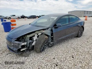 2025 Tesla Model 3 Long Range z VIN 5YJ3E1EA5SF000814, wystawiony jako Copart lot #57821595 z przebiegiem 727 mil mil oraz Szkoda całkowita • Salvage title. Historia ofert i sprzedaży dostępna na DreamBid. Obrazek 1.