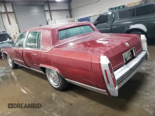 1988 Cadillac Brougham z VIN 1G6DW51Y2JR766782, wystawiony jako Copart lot #83797924 z przebiegiem 63 601 mil mil oraz Szkody całkowita. Historia ofert i sprzedaży dostępna na DreamBid. Obrazek 2.
