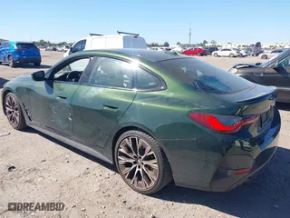 2022 BMW 4 Series 430i with VIN WBA63AV02NFM97103, listed as a IAAI auction lot 41756950 with 31,451 mi miles. Bid and sale history available at carsss.com. Image 3.