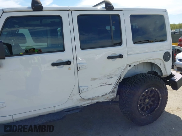 2017 Jeep Wrangler Unlimited Sahara with VIN 1C4BJWEG5HL588535, listed as a IAAI auction lot 42013571 with 70,012 mi miles. Bid and sale history available at carsss.com. Image 6.
