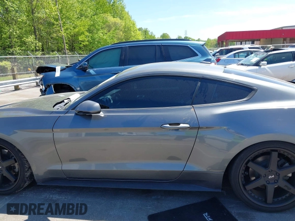 2021 Ford Mustang EcoBoost with VIN 1FA6P8TH3M5100601, listed as a IAAI auction lot 42060948 with 79,677 mi miles and . Bid and sale history available at DreamBid. Image 14.