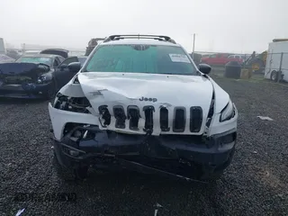 2017 Jeep Cherokee Trailhawk L Plus with VIN 1C4PJMBS2HD225011, listed as a IAAI auction lot 40802716 with 73,714 mi miles. Bid and sale history available at carsss.com. Image 12.