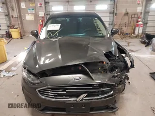 2020 Ford Fusion SE z VIN 3FA6P0LU4LR118809, wystawiony jako IAAI lot #41952995 z przebiegiem 35 353 mil mil oraz . Historia ofert i sprzedaży dostępna na DreamBid. Obrazek 13.