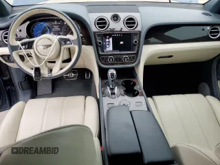 2019 Bentley Bentayga V8 z VIN SJAAM2ZV5KC024865, wystawiony jako Copart lot #42869533 z przebiegiem 23 687 mil mil oraz . Historia ofert i sprzedaży dostępna na DreamBid. Obrazek 8.