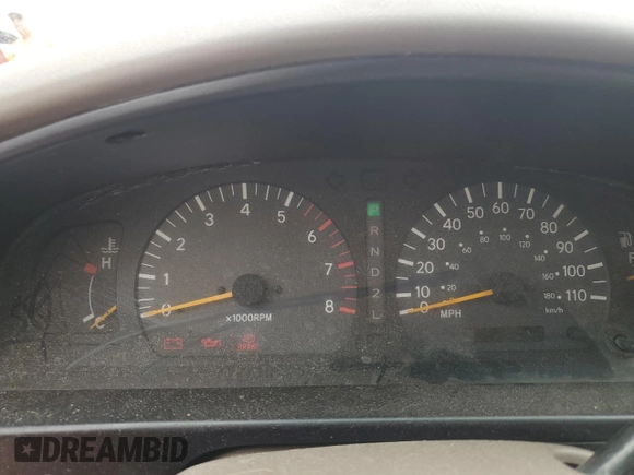 1999 Toyota Tacoma z VIN 4TAVL52N8XZ435689, wystawiony jako Copart lot #52162105 z przebiegiem 2 317 301 mil mil oraz Szkoda całkowita • Salvage title. Historia ofert i sprzedaży dostępna na DreamBid. Obrazek 9.