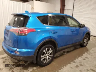 2018 Toyota RAV4 LE with VIN JTMBFREV9JJ197097, listed as a Copart auction lot 50042325 with 167,978 mi miles and Salvage Title. Bid and sale history available at DreamBid. Image 3.